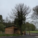 Retrospective arboricultural impact assessment on a field shelter stable for miniature pony with new grass bank and improved tree rooting area