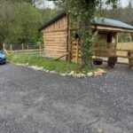 etrospective arboricultural impact assessment on a field shelter stable for two miniature ponies with new grass bank and improved tree rooting area