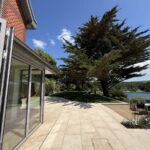 Salcombe South Hams showcasing wonderful trees overlooking the Kingsbridge Estuary We look after these trees recommending pruning for health and safety and to shape the views